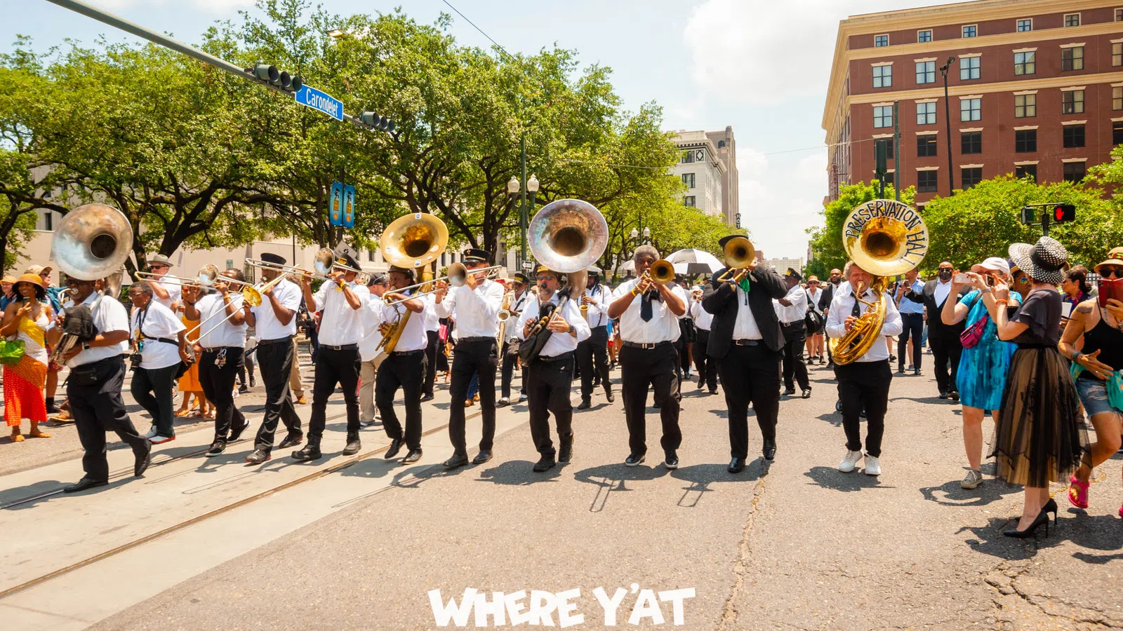 a group of people in clothing marching