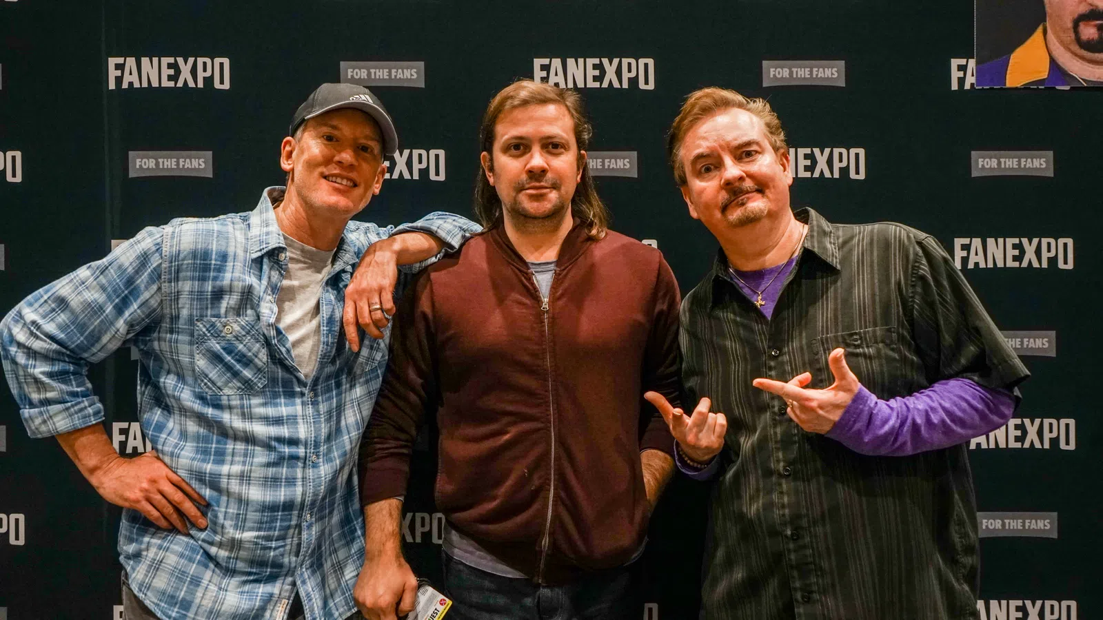 a group of men posing for a photo
