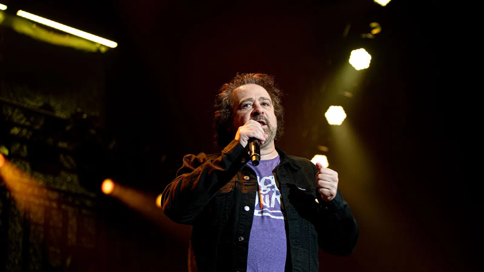 Adam Duritz singing into a microphone