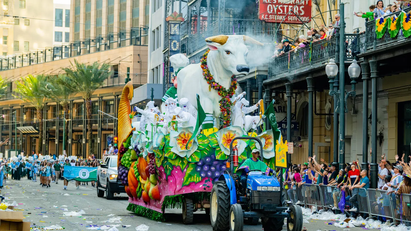 a parade with a horse and carriage