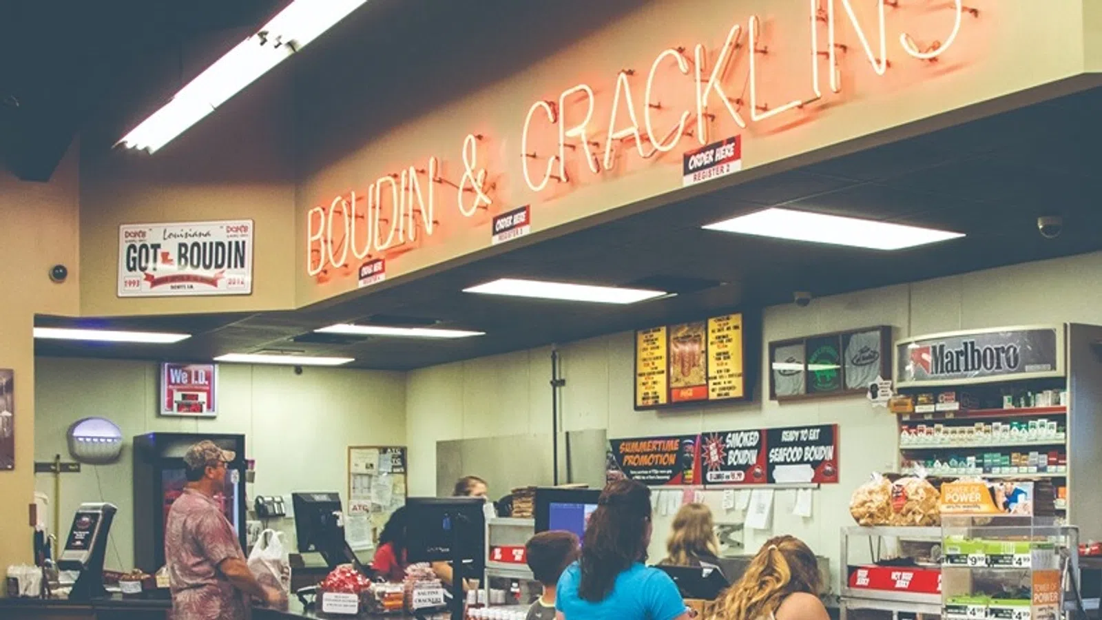 a group of people in a grocery store