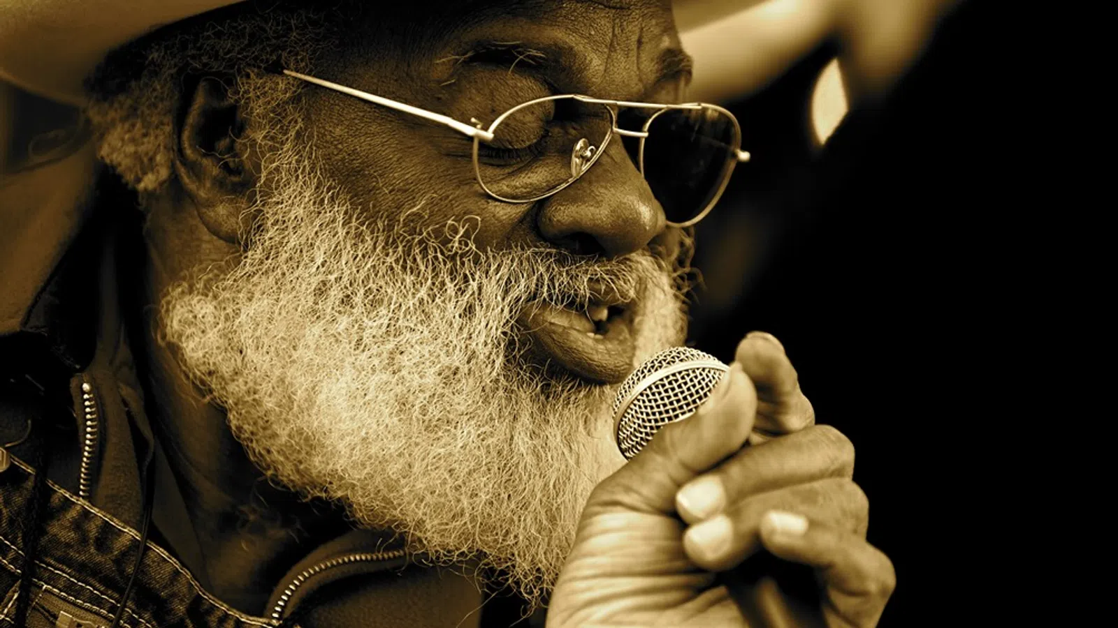 a man with a beard and sunglasses