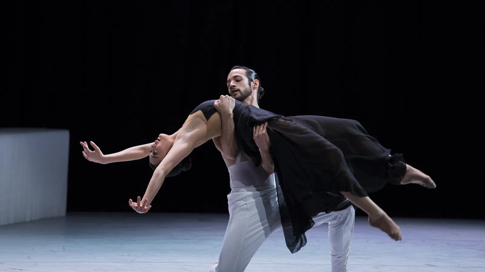 a man and woman dancing