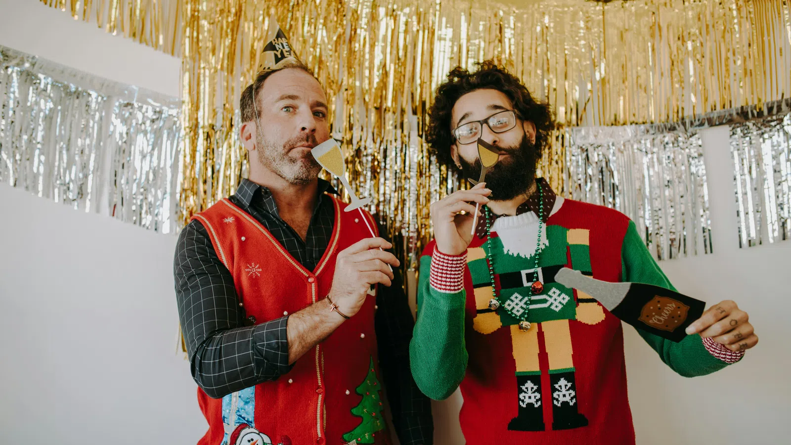 two men wearing clothing