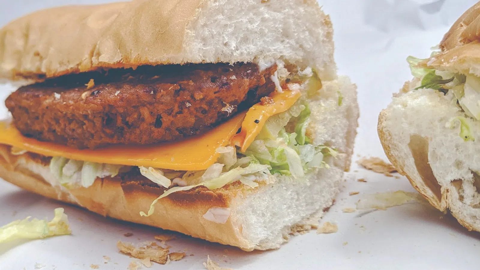 a sandwich with a side of cheese