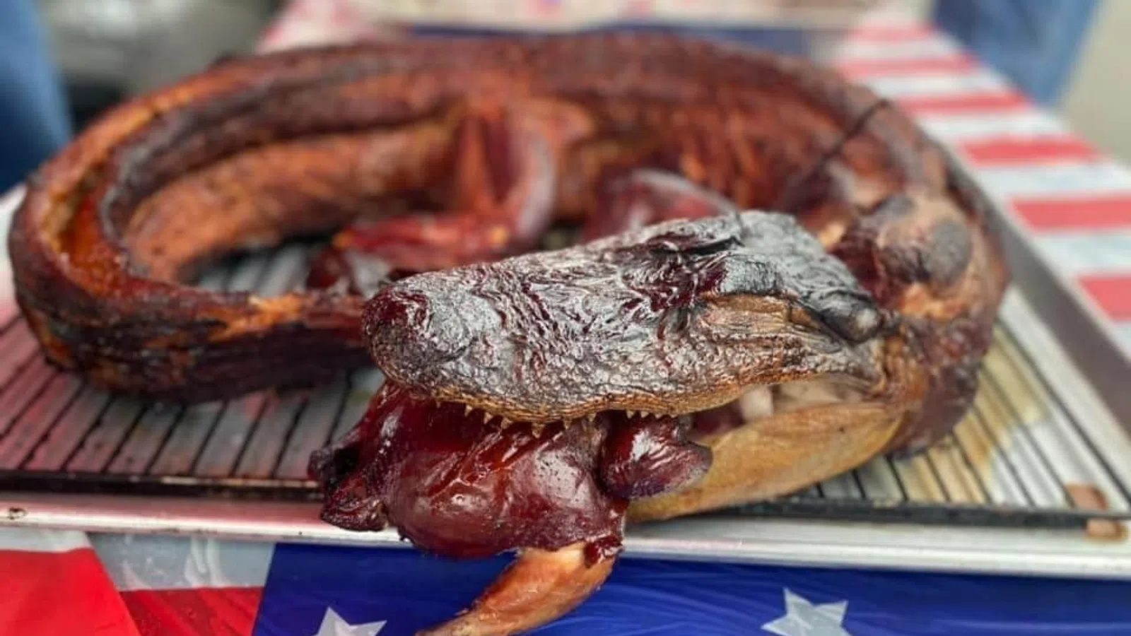 a group of cooked fish on a grill