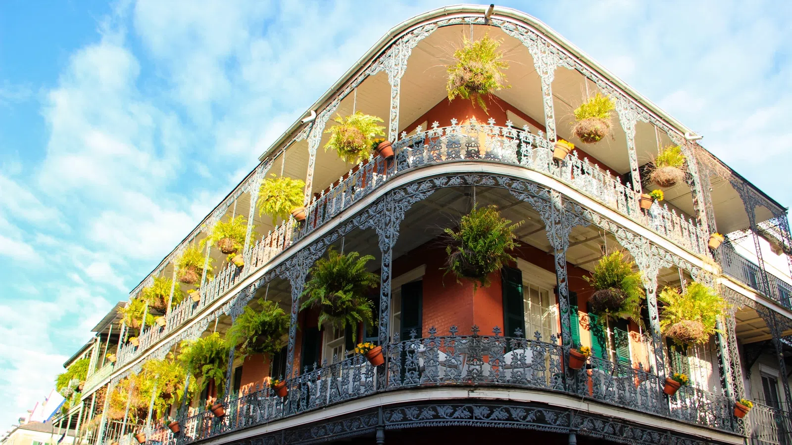 a building with plants growing on the roof