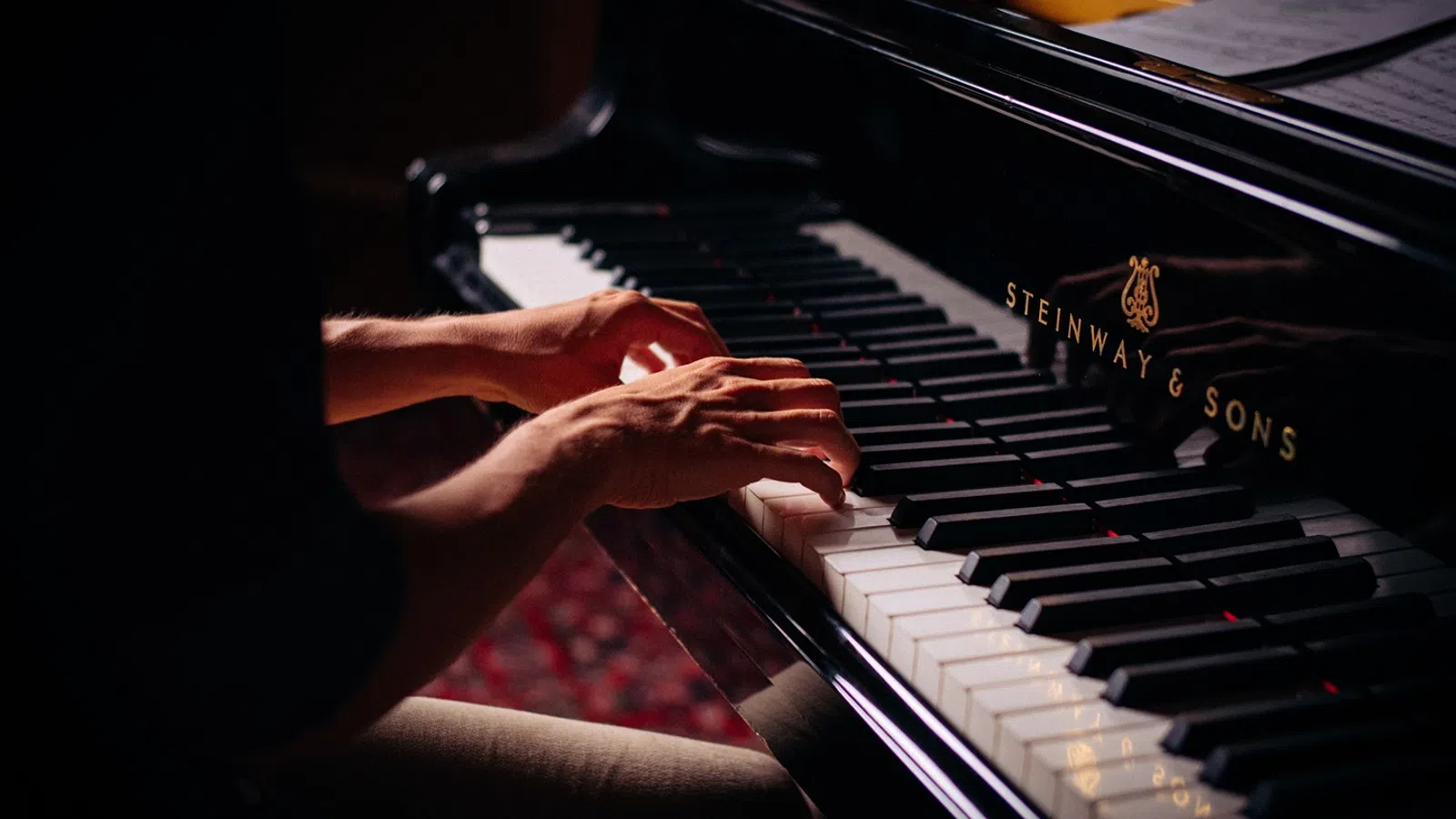 a person playing a piano