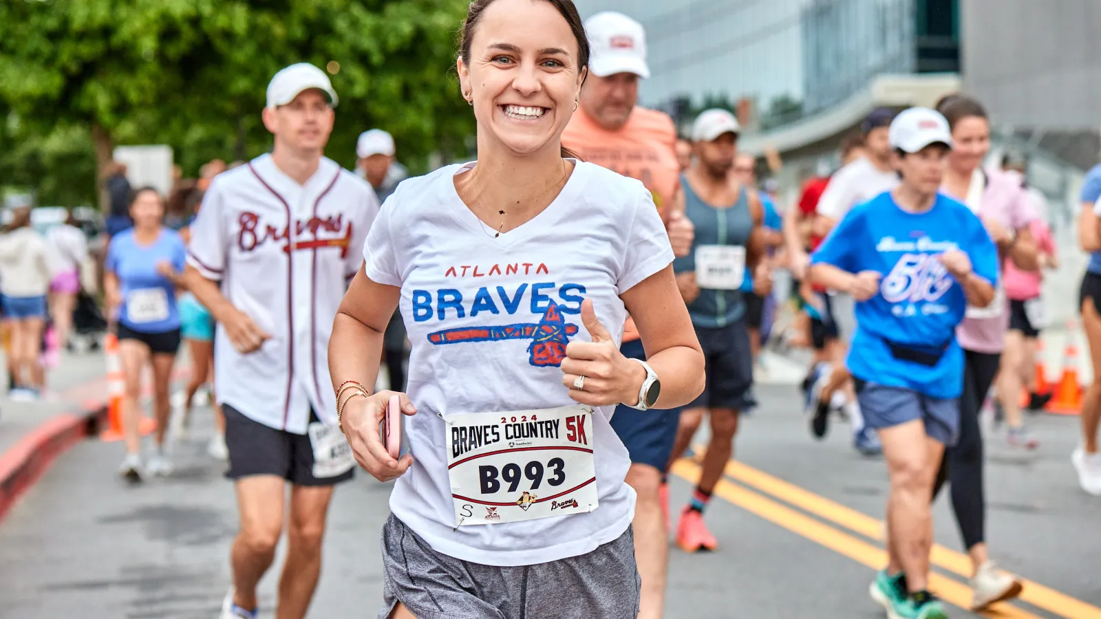 Participants running in the Braves Country 5K, showcasing a vibrant community event.