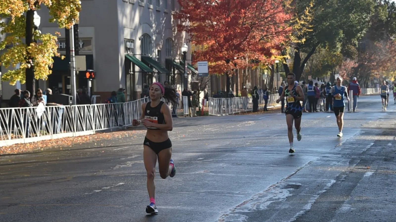 people running on a street