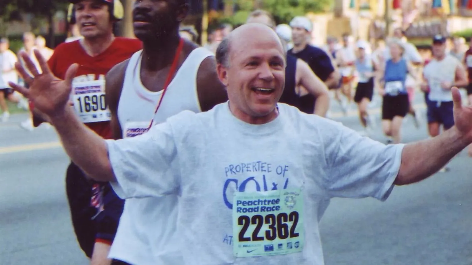 Dan T. Cathy et al. running in a marathon