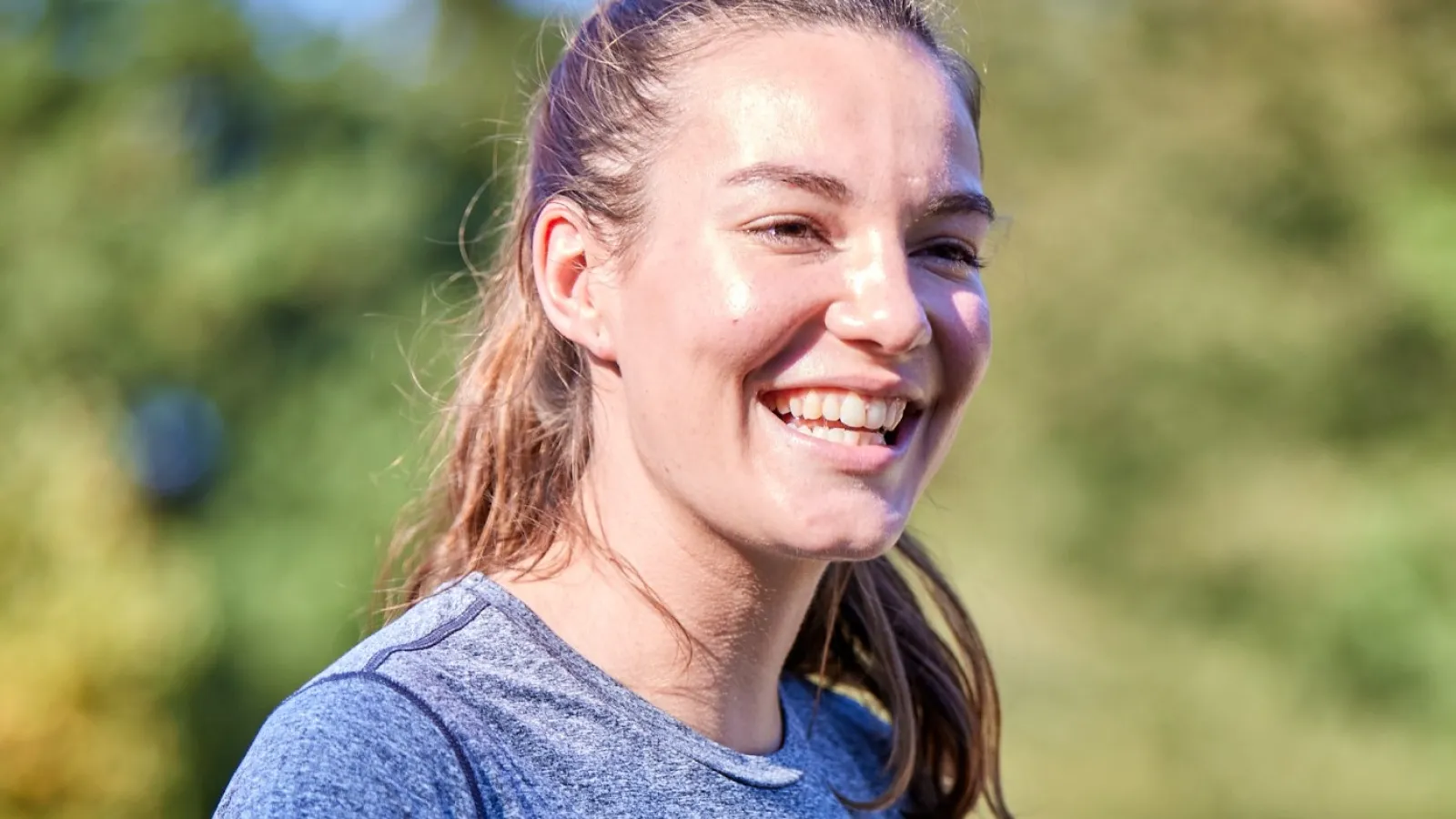 a person smiling outside