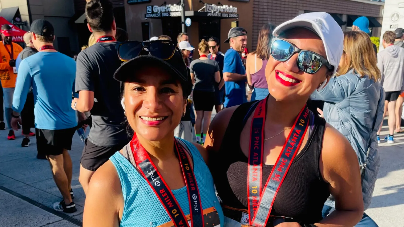 two women wearing sunglasses