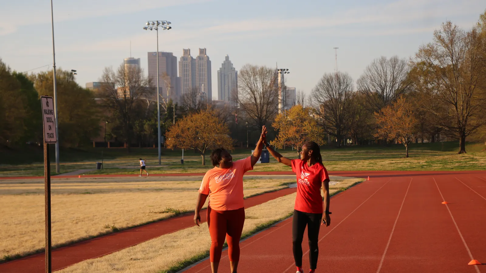 a couple of people on a track