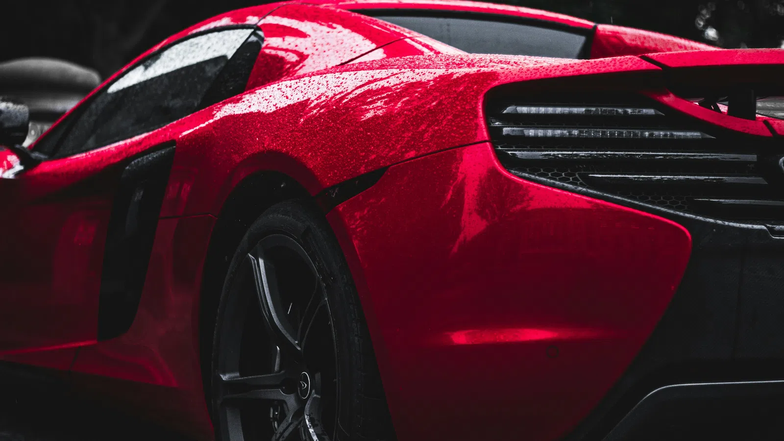 the front of a red sports car