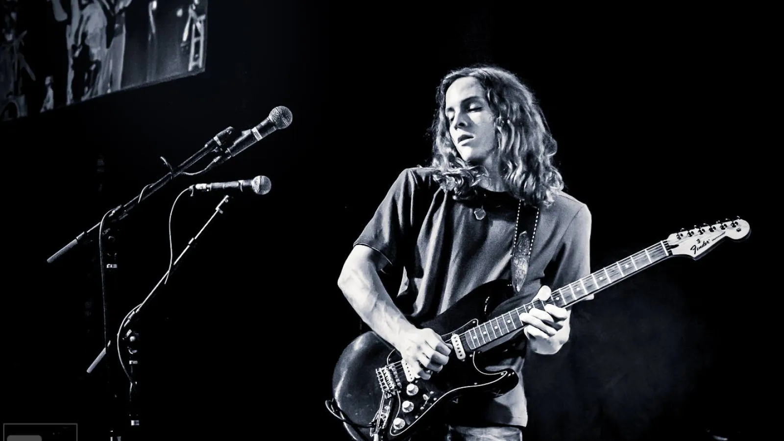 an image involving indoor person table