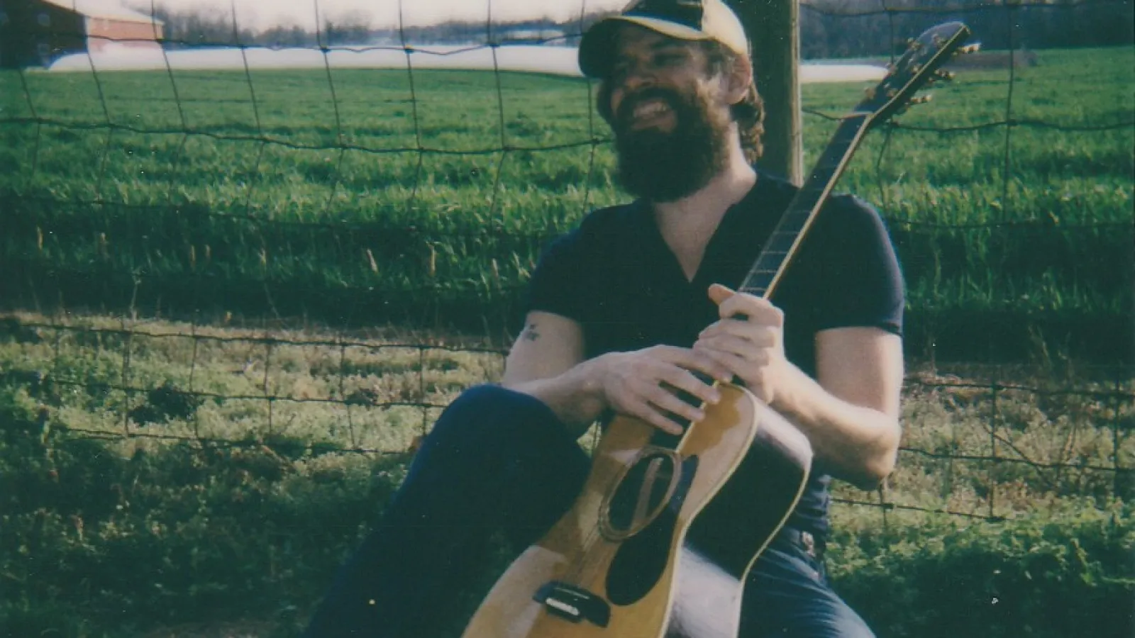 a person playing a guitar