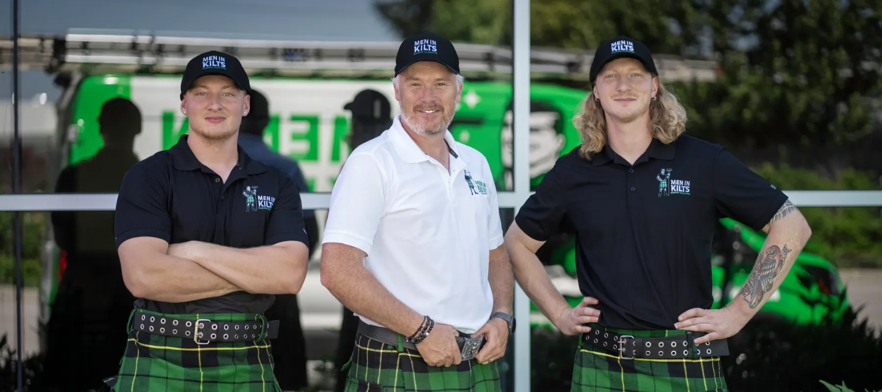 a group of men in kilts