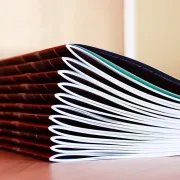 A stack of Saddle Stitched books