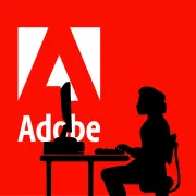 Silhouette of a graphic artist creating an artwork file