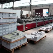 Stacks of page blocks in a print facility ready to be Perfect Bound