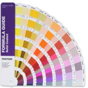 A Pantone color guide book fanned open