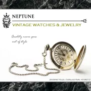 Print advertisement for a gold pocket watch displayed on white background with a black marble backdrop
