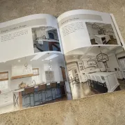 A Saddle Stitched booklet lying open on a counter