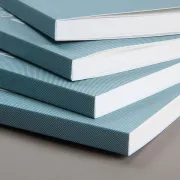 A stack of four books with Perfect Binding