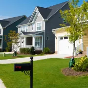 A residential street with mailboxes in foreground