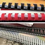 Two comb bound books pictured above four spiral bound books