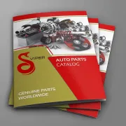 Stack of red and gold auto part catalogs with images of car parts on the cover.