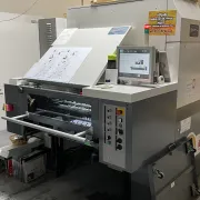 A commercial printing press known as a J-Press