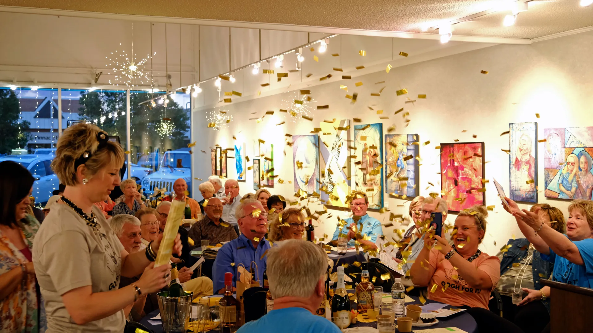 a group of people sitting at tables