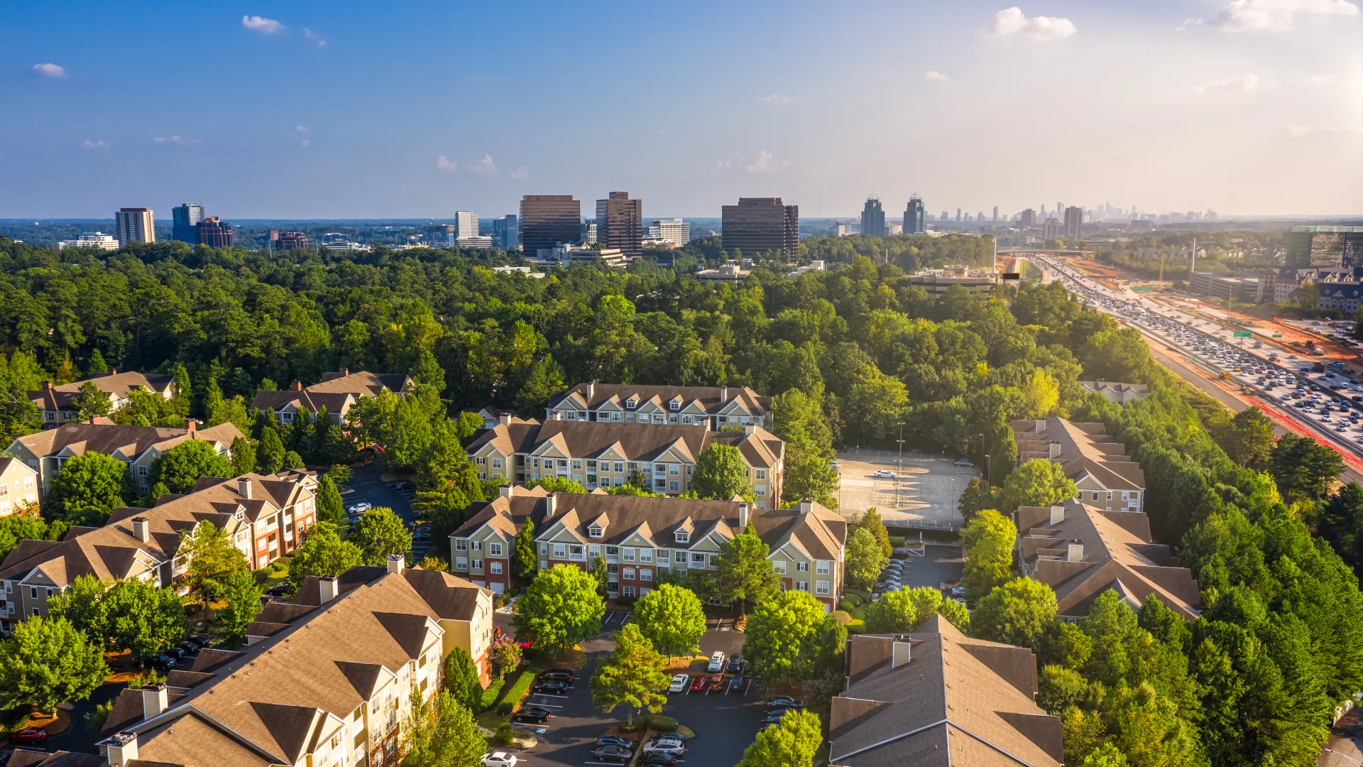 a city with many trees and buildings