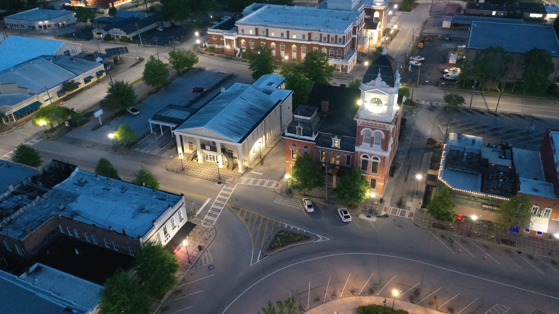 a street with buildings and trees