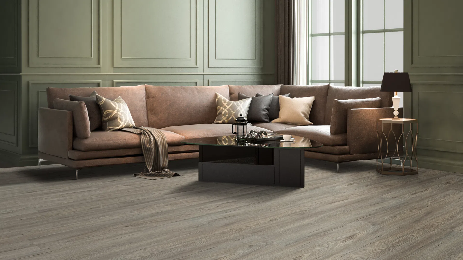 Modern living room with brown L-shaped sofa, decorative pillows, glass coffee table, and large windows.