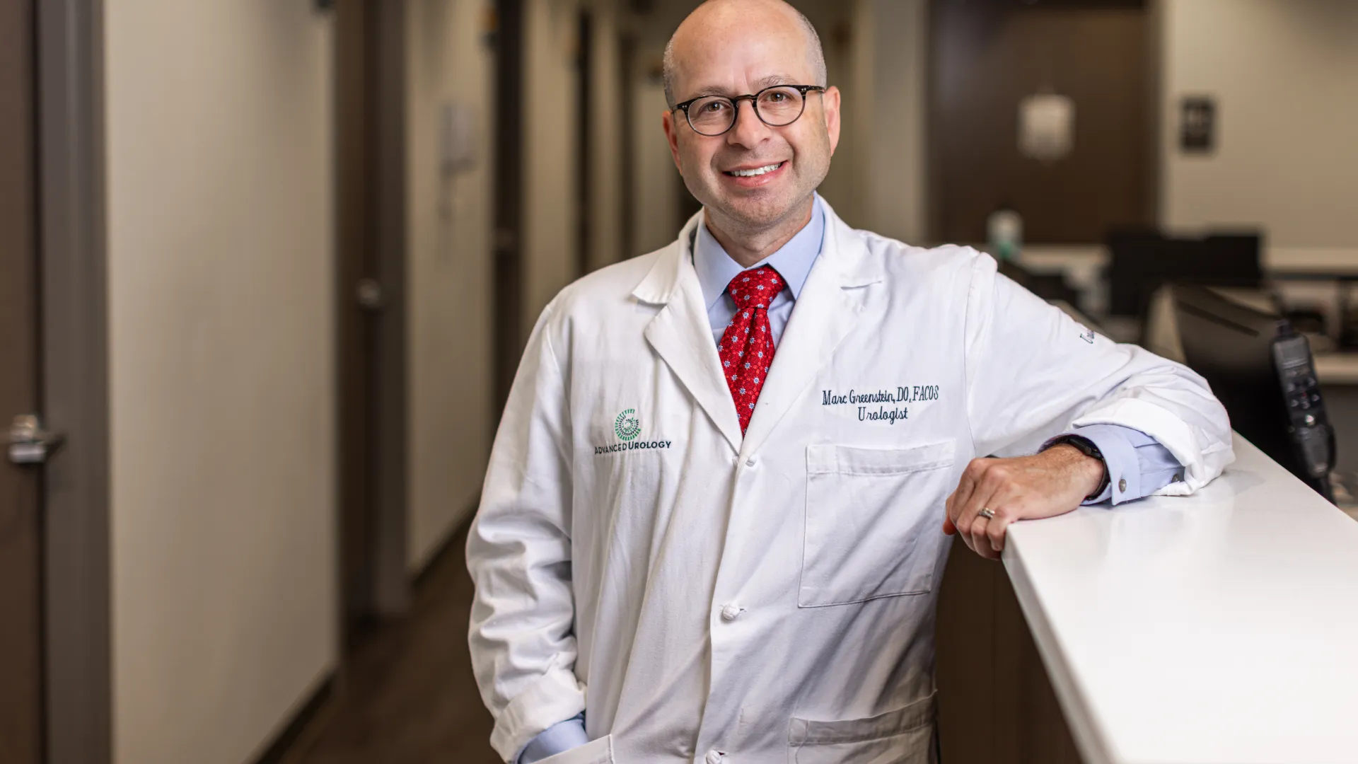 a man in a white coat