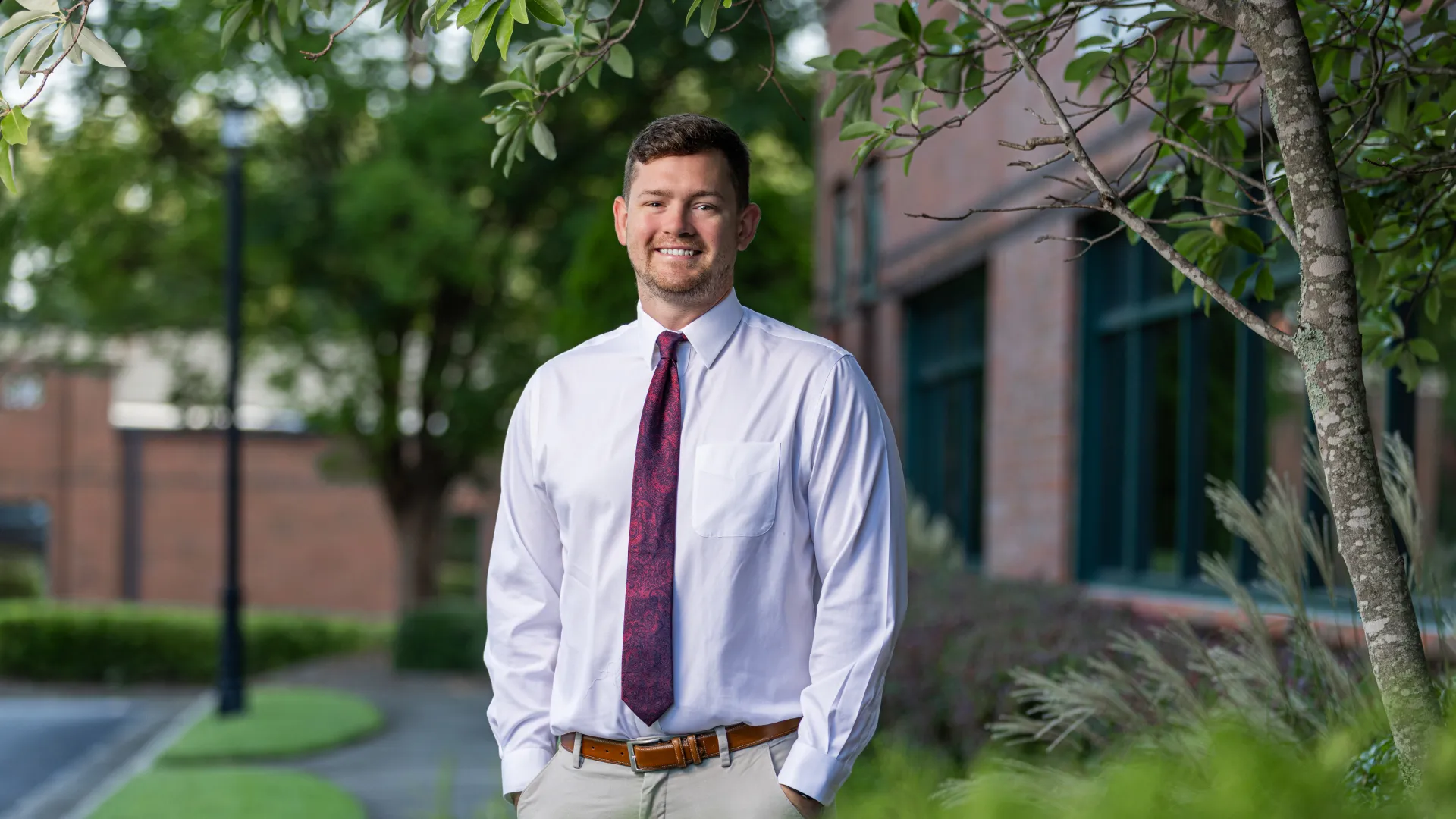 a man in a tie and a white shirt