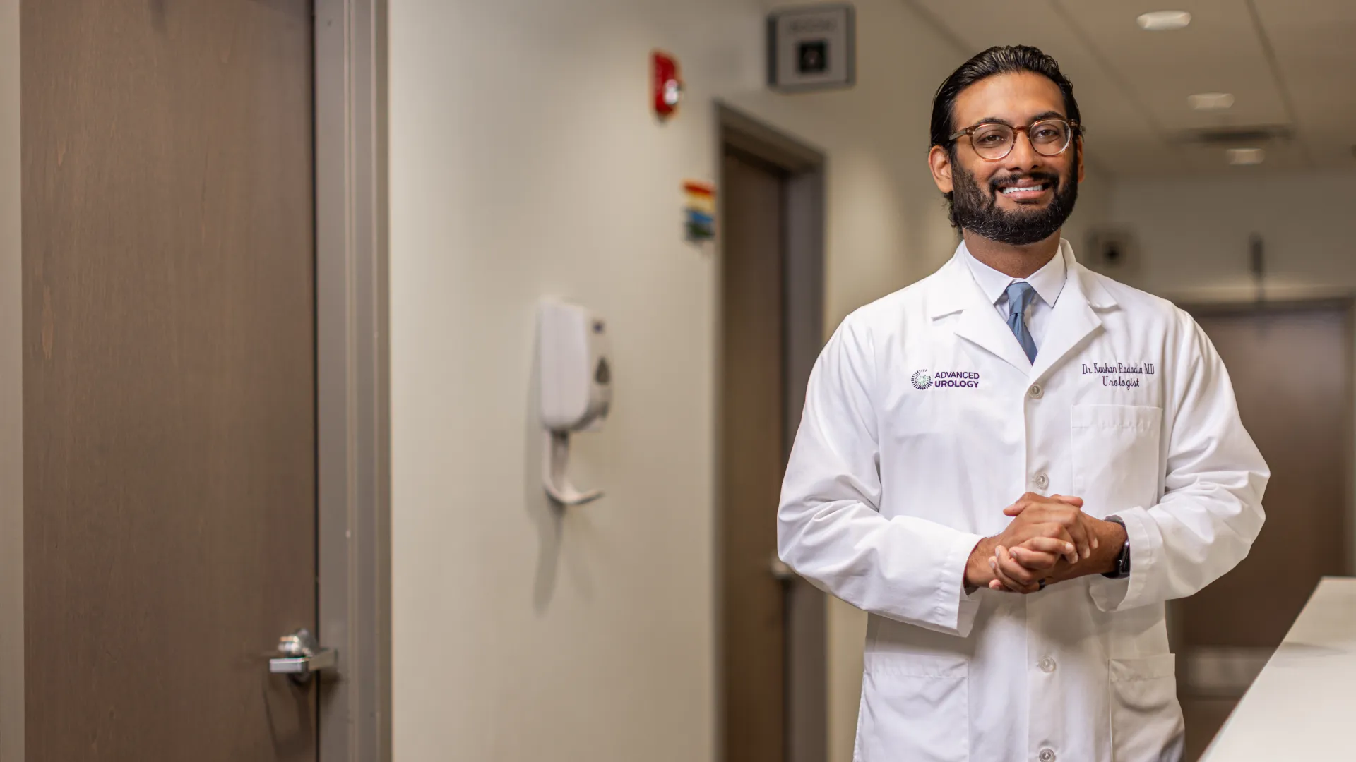 a man in a white coat