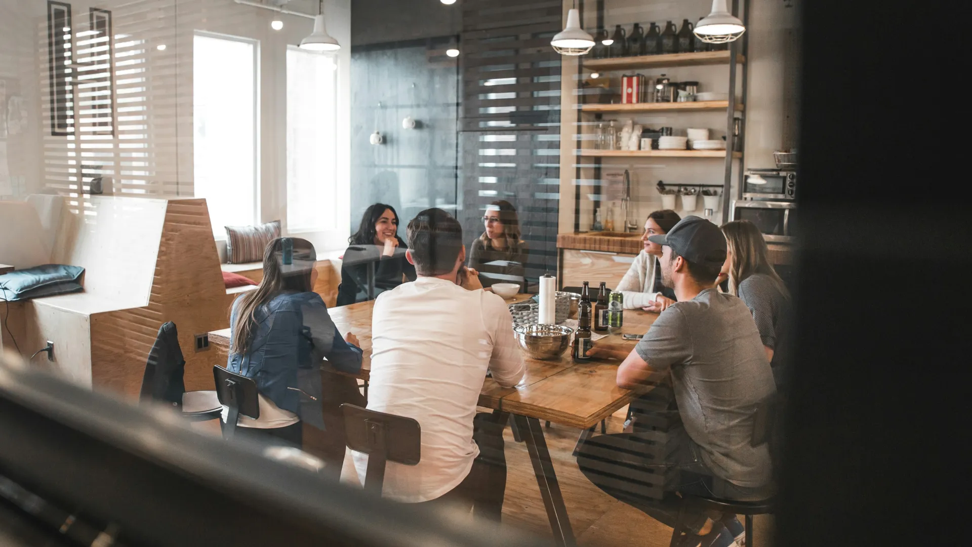 a group of people sitting at tables