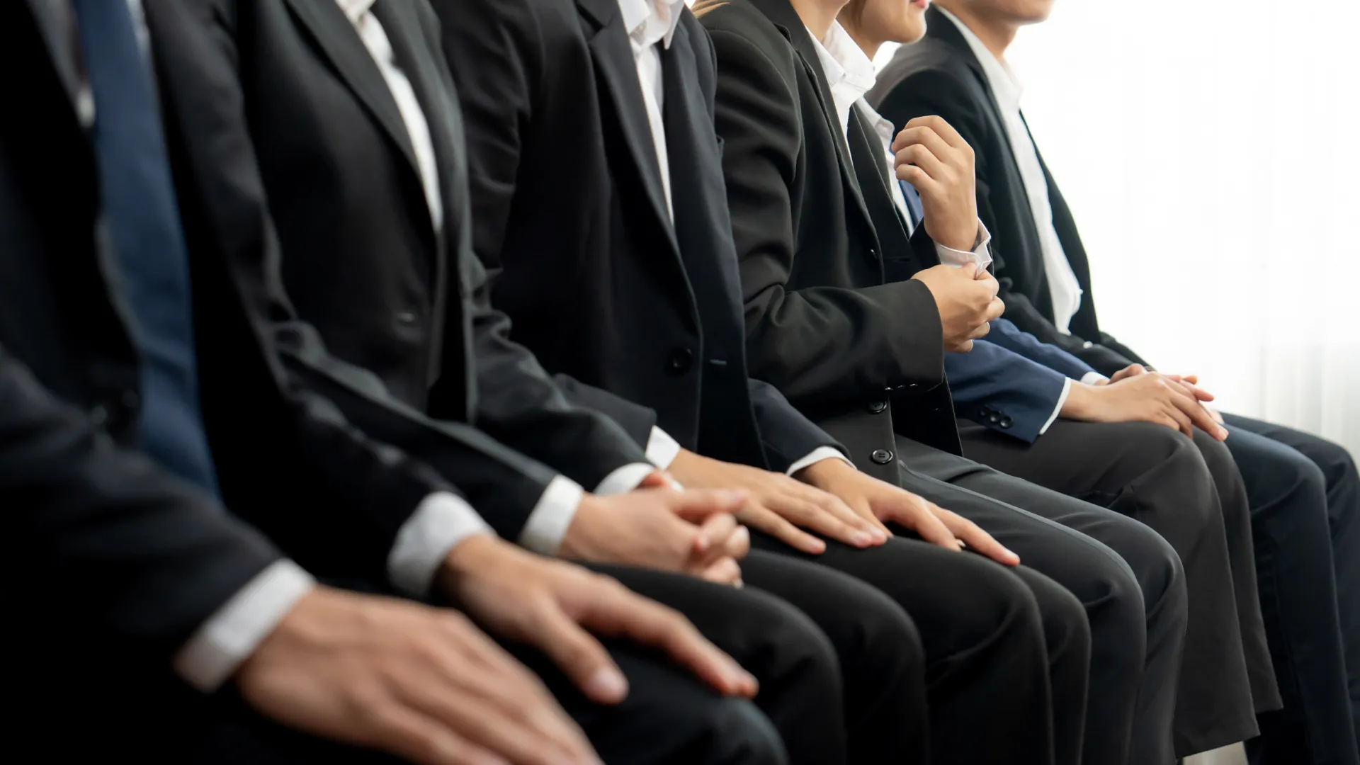 a group of people sitting in chairs