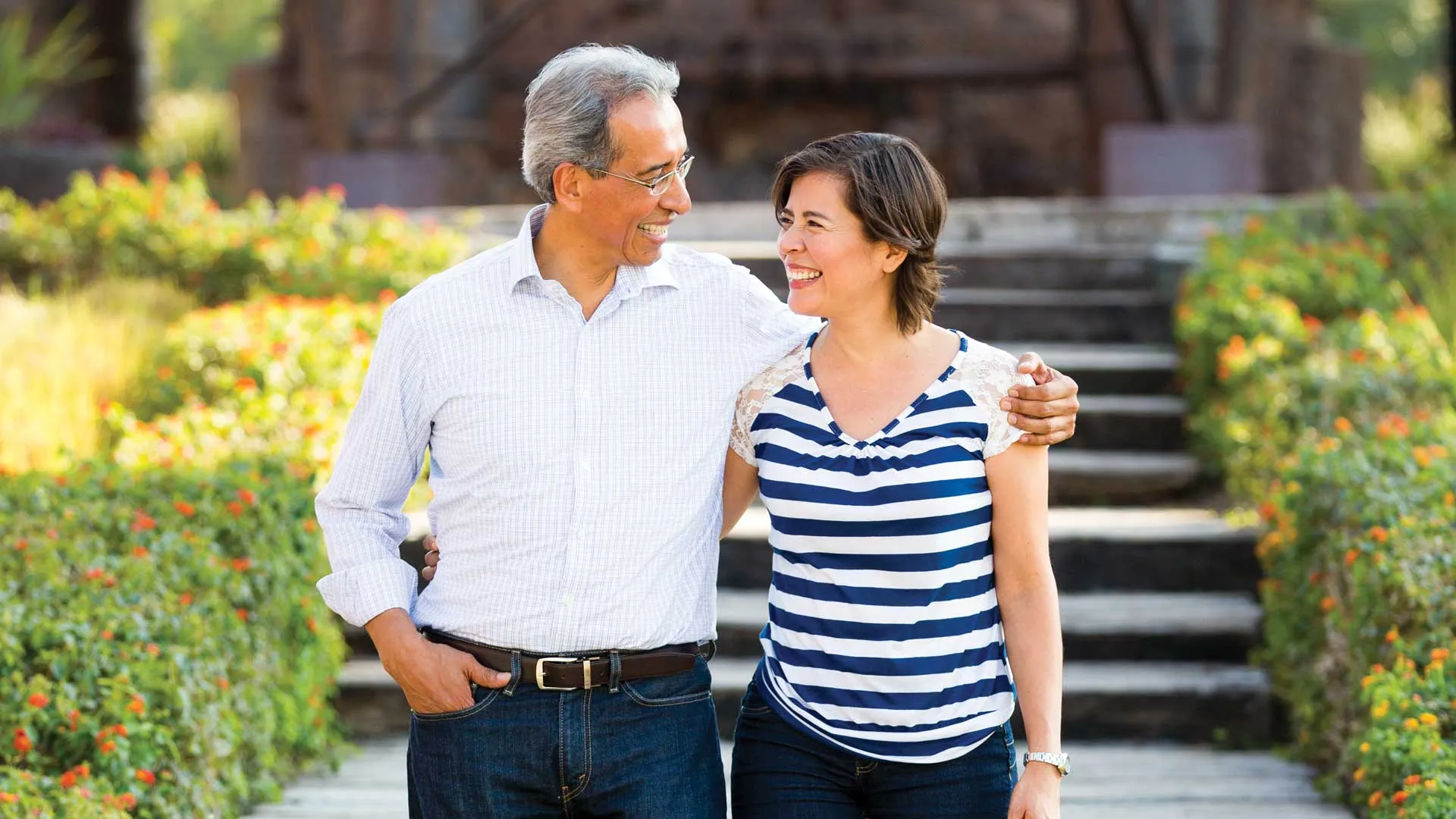 a man and a woman holding hands
