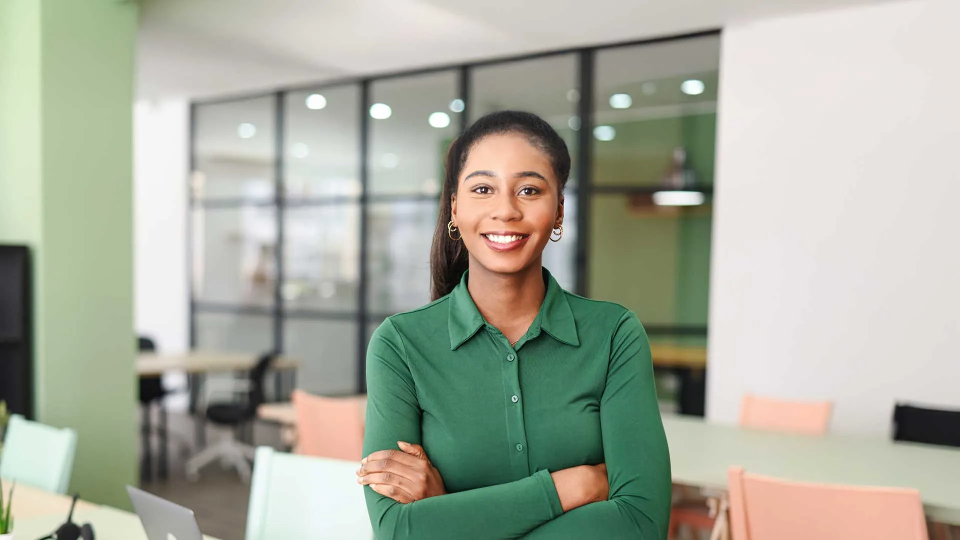 a woman in a green shirt