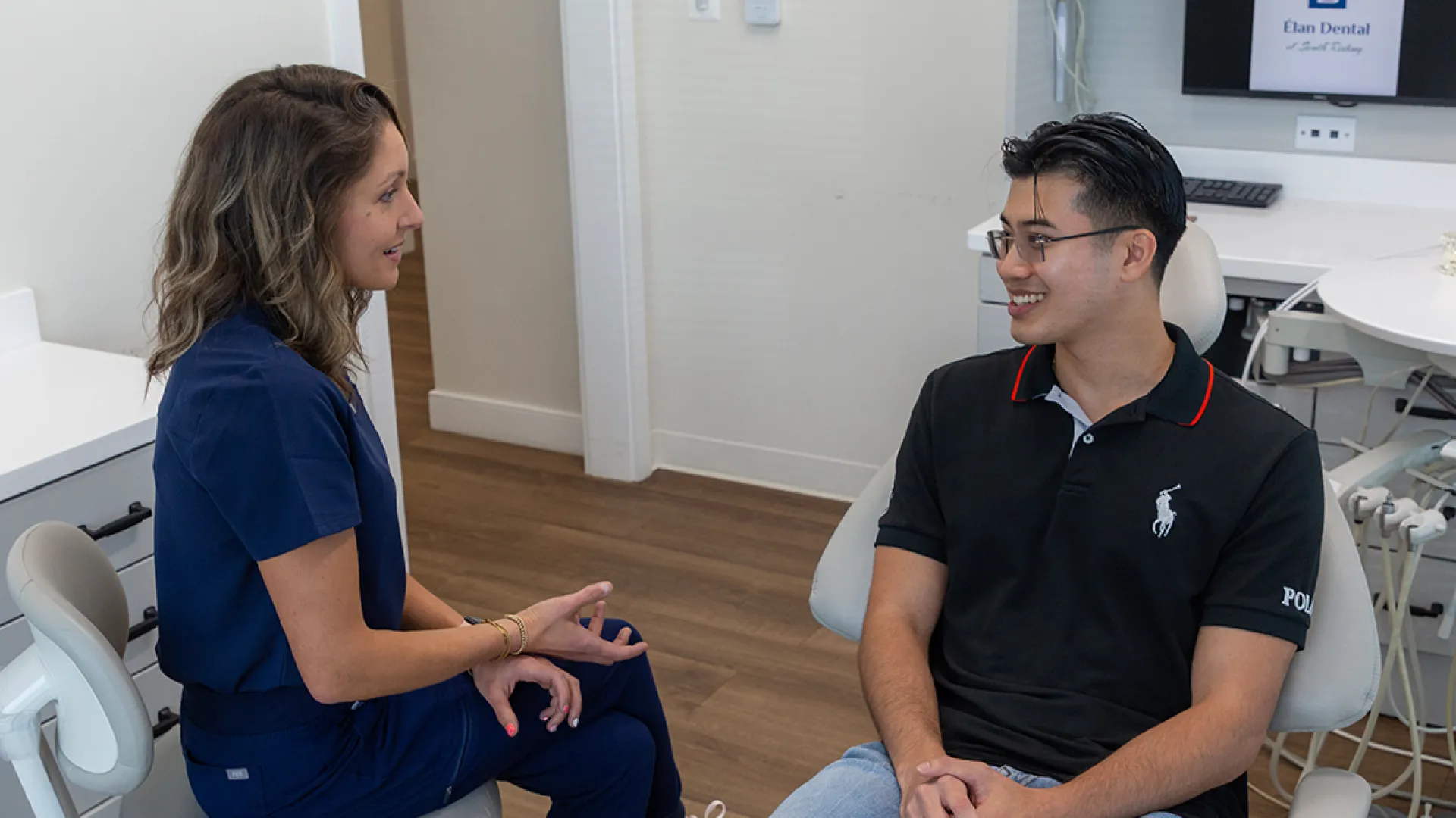 Charlotte Rampling sitting on a couch