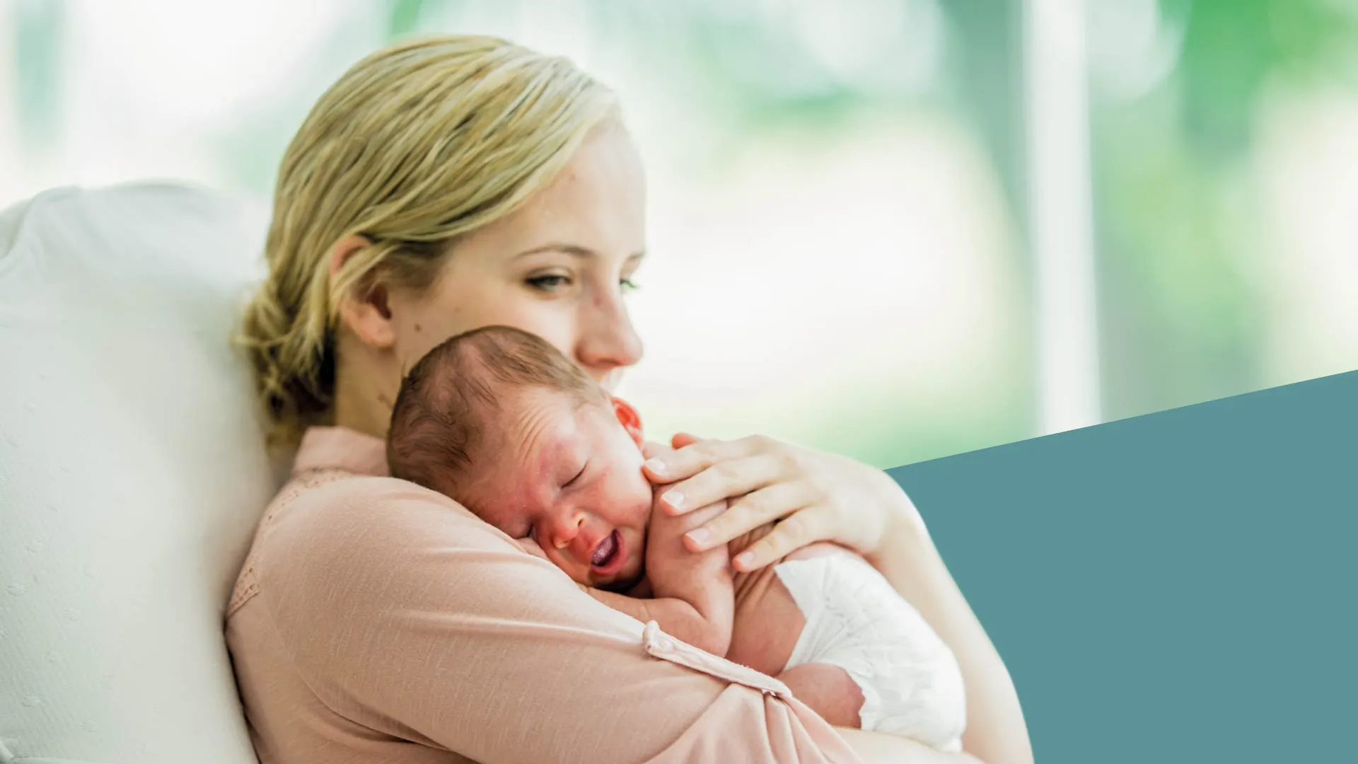 a person holding a baby