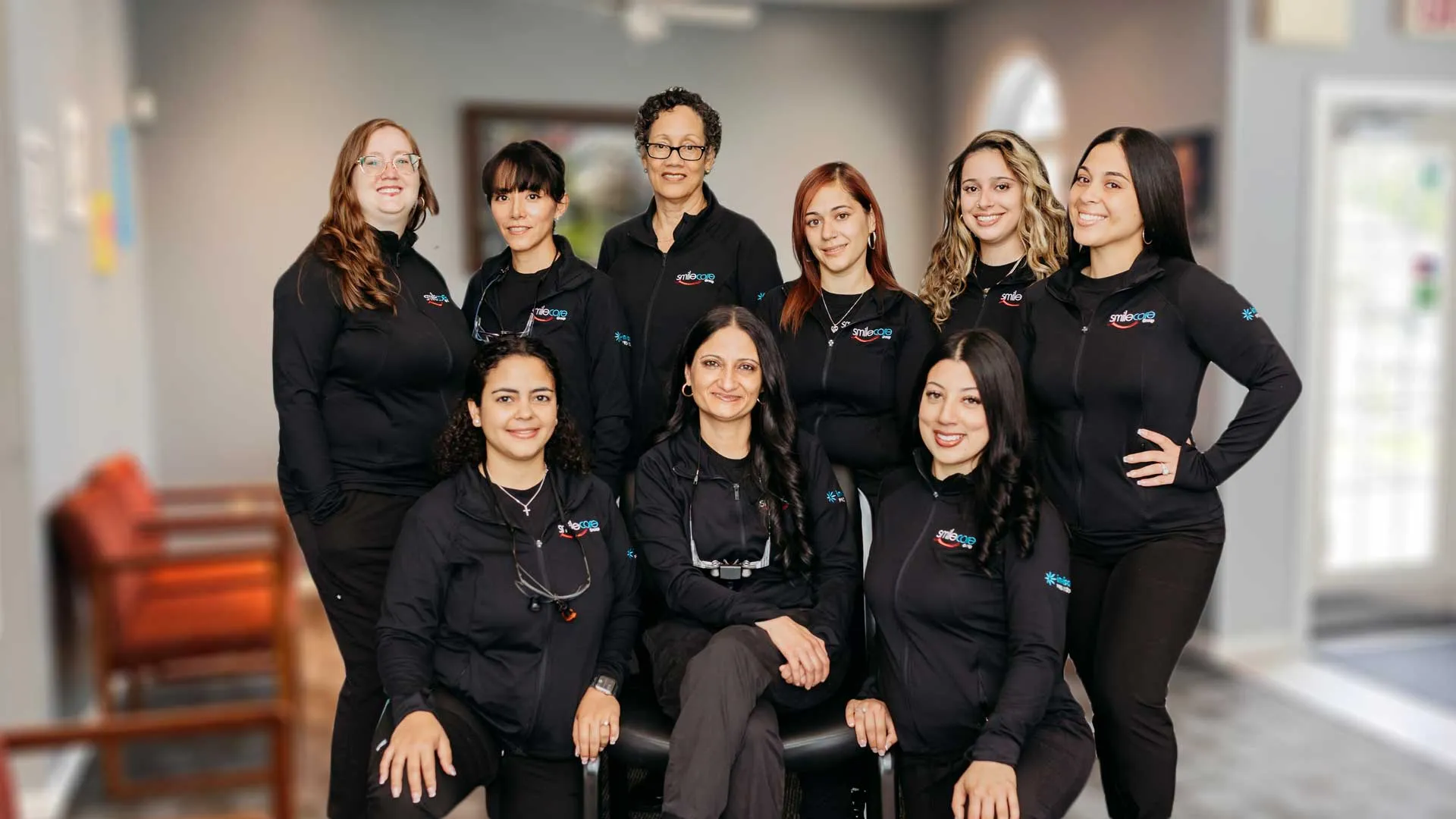 Surinder Kaur et al. posing for a photo