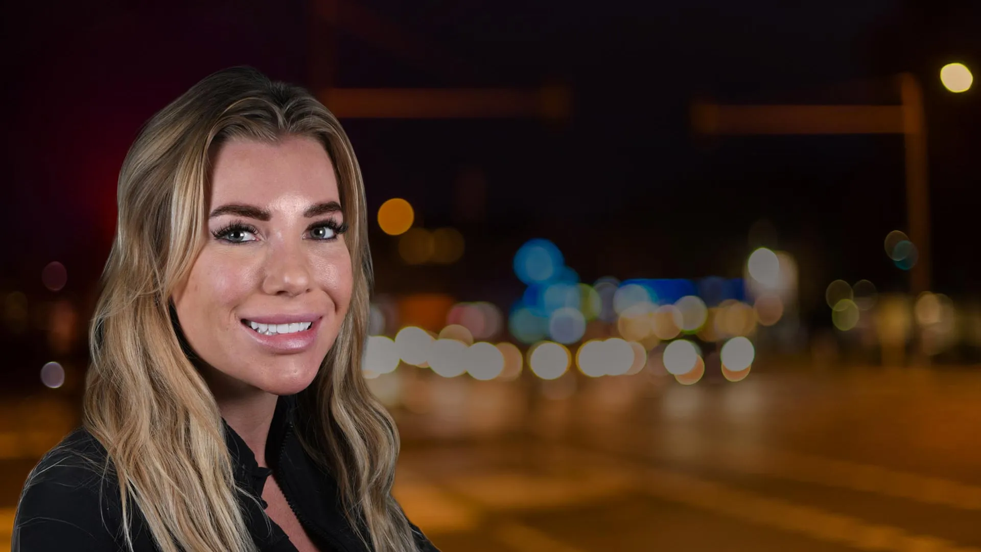 a woman smiling at the camera