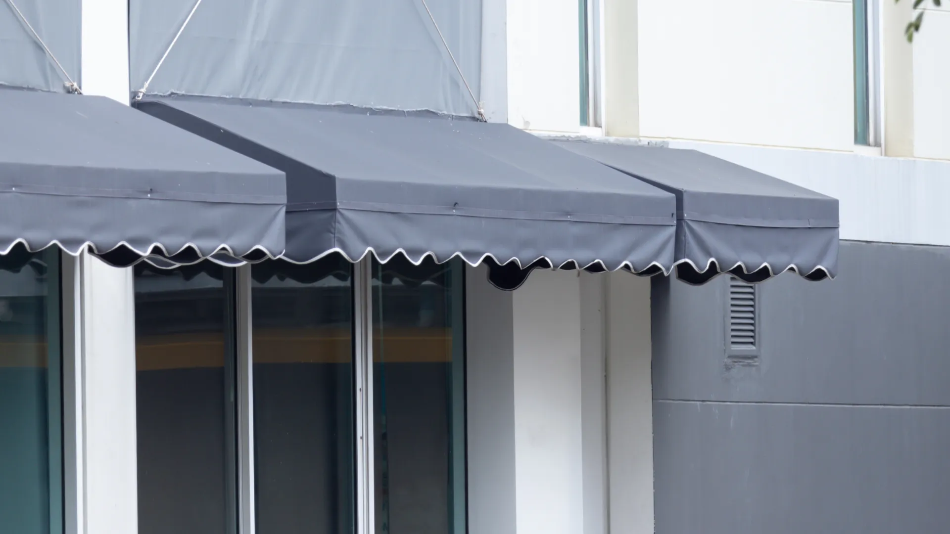 a black awning over a building