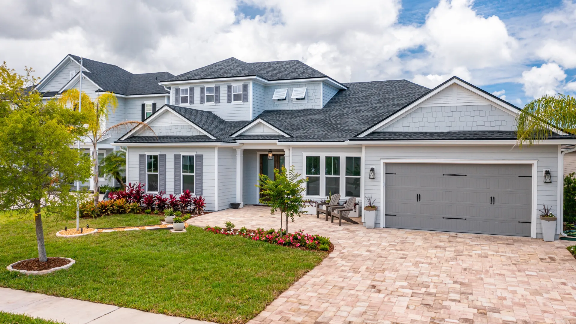 a house with a brick driveway